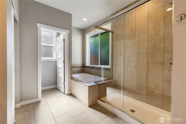 Large walk in shower and deep tub.