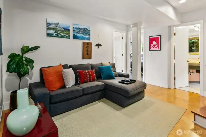 The media room on the garden level is designed for relaxation and entertainment, a cozy counterpoint to the home’s open living spaces above. Tucked within its own suite of rooms, it balances comfort with the quiet seclusion of Olmsted’s park.