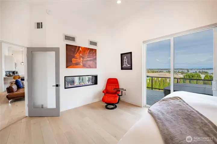 Primary with fireplace & deck access