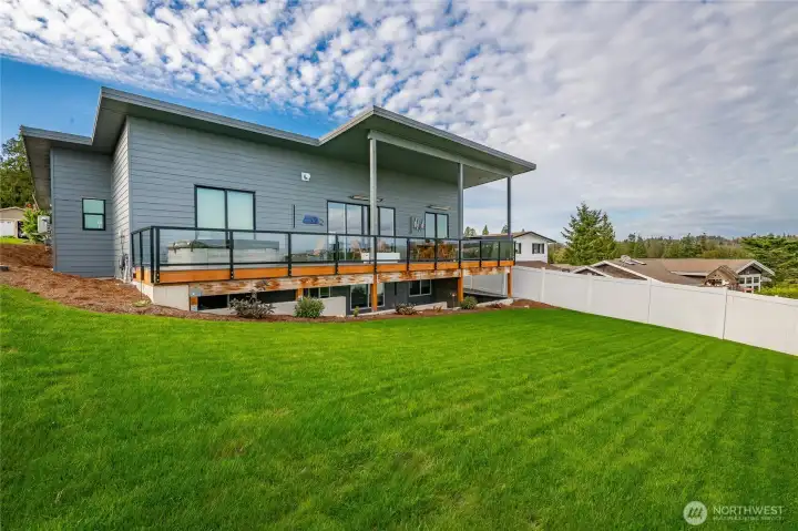 Spacious East facing deck and yard