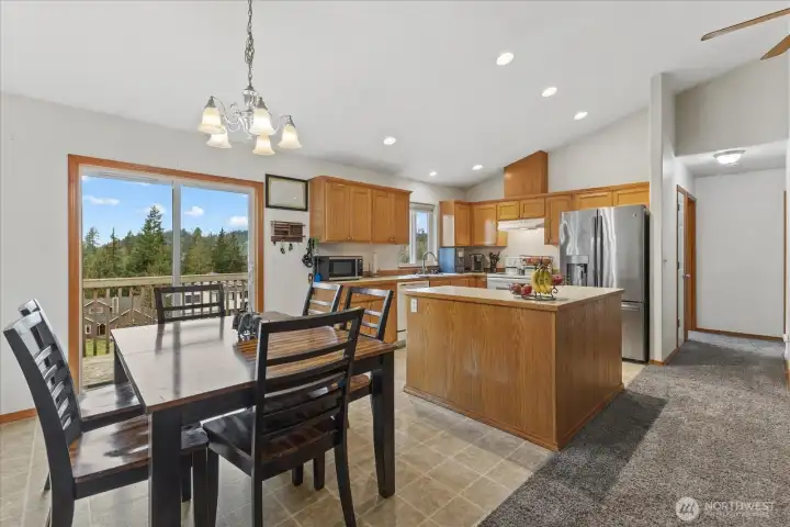 Convenient dining area open to kitchen, living room and deck. Hallway on right leads to bedrooms #1, #2 and hall bathroom. All current living area is on the main level. Ideal for people who don't like stairs