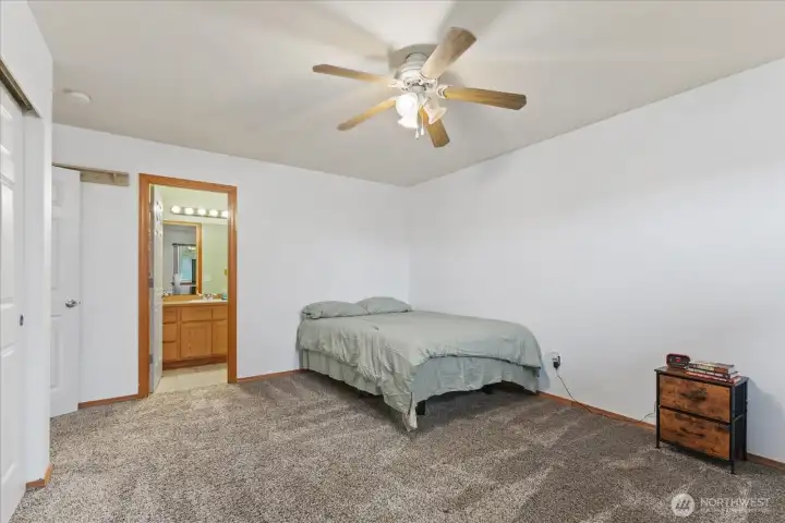 Primary bedroom and bathroom