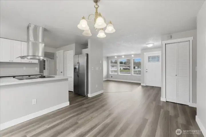 Bright & Cheery Front Entrance To Living Room-Kitchen Area