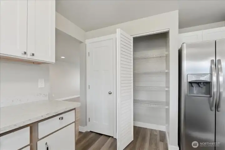 Adjacent to Kitchen On The Left Is The Convenient Oversized Family Room.