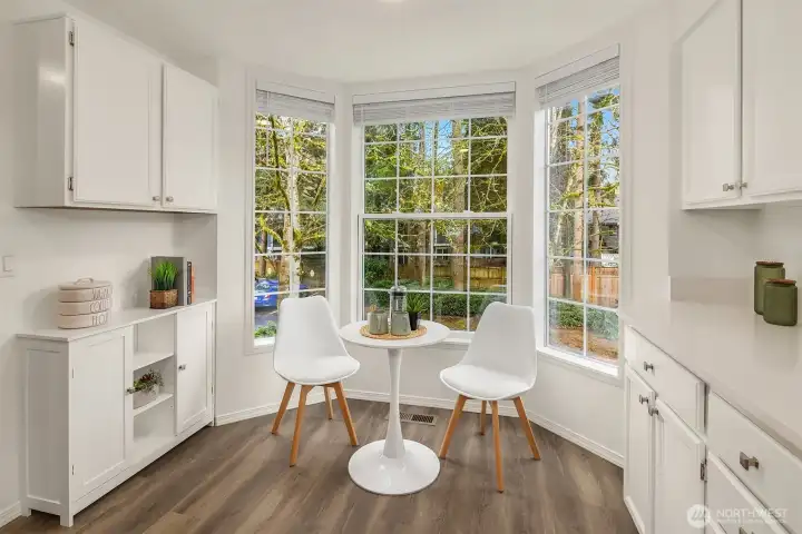 Charming bay window is the perfect breakfast nook.  Additional built-in storage could be the ideal coffee or tea bar.