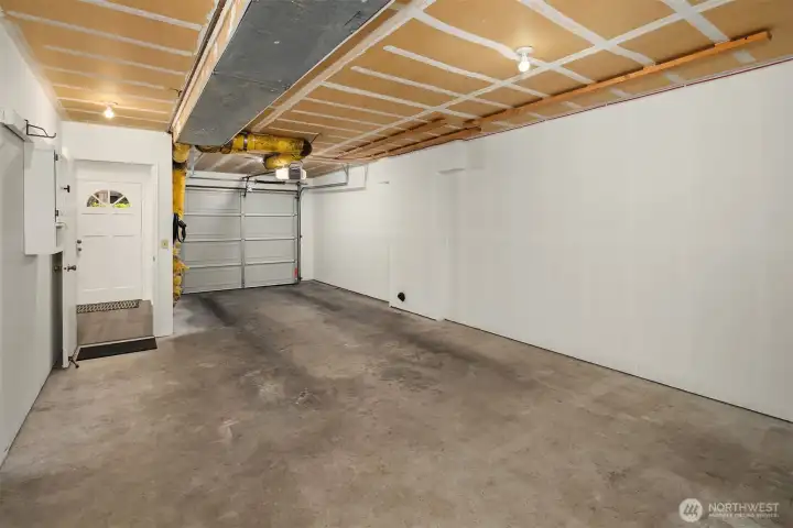 Oversized 2 car tandem garage with storage space