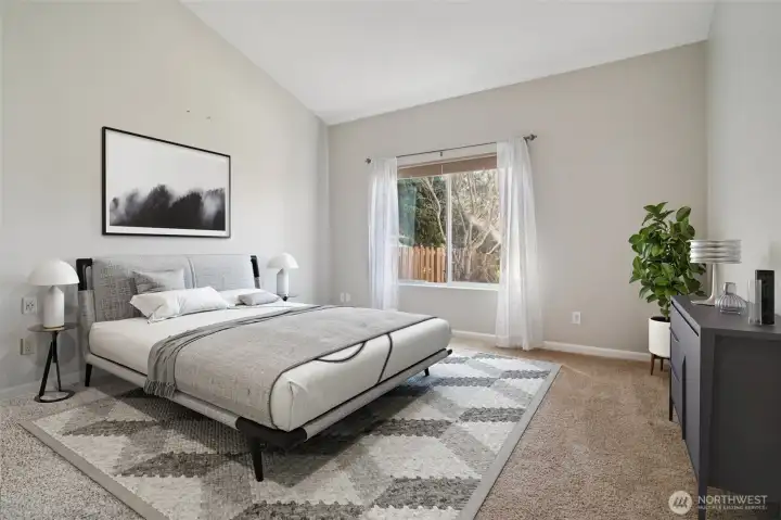 Virtual Staged - Primary bedroom on main