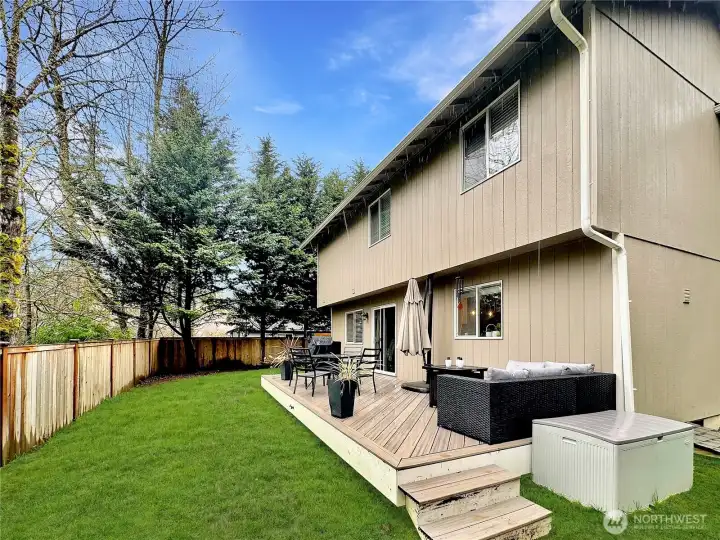 View of rear yard and deck