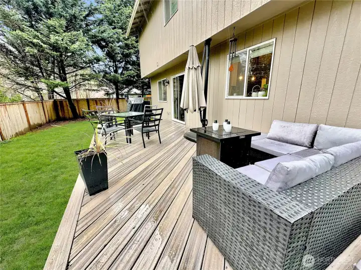 Newer Trex deck extends your living space to the outdoors.  A wonderful place to enjoy the private setting.