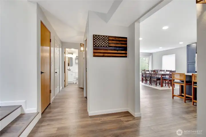 From the hall you can go to the 3/4 bath or downstairs to the rec room
