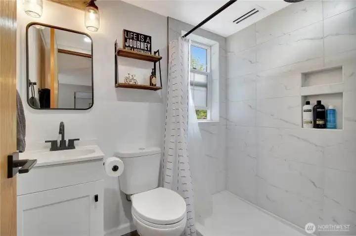 A 3/4 bath on the main is lightfilled