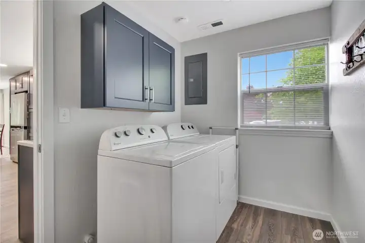 Laundry and pantry is perfectly located between the kitchen and spacious two car garage so it can double as a "mud room"