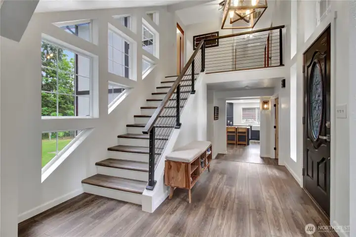 Back to entry... you can see how light filled this house is as you go upstairs to the bedroom level