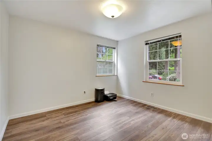 This is the second bedroom with large windows