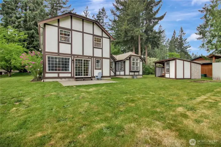 Back of house shows the large level yard