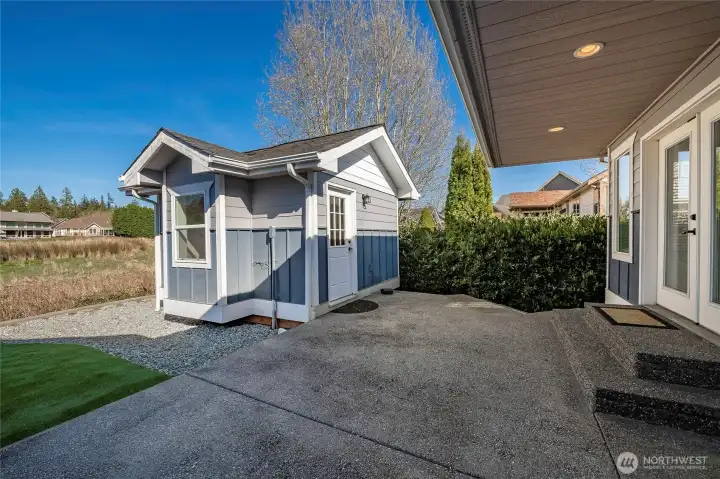 Back patio with detached living space