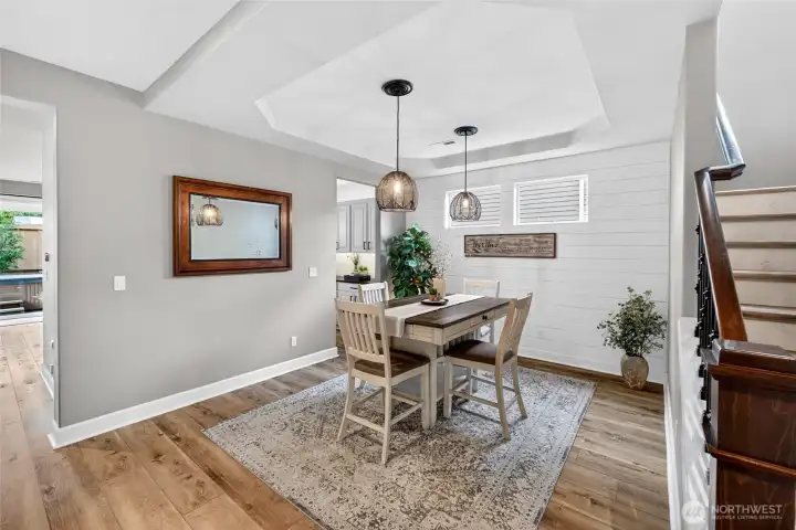 From the dining space, enter directly into the living space or to the kitchen through the butler's pantry.