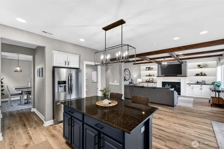 A floorpan that truly flows and offers functionality for everyday living. Easily watch TV while cooking in the kitchen!