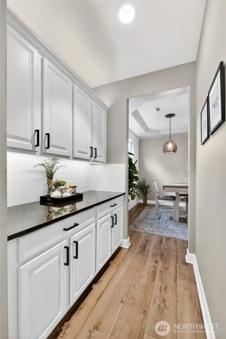 Butler's pantry, mini prep-kitchen, coffee bar, small appliance parking, entertainment/hosting storage, you name it!