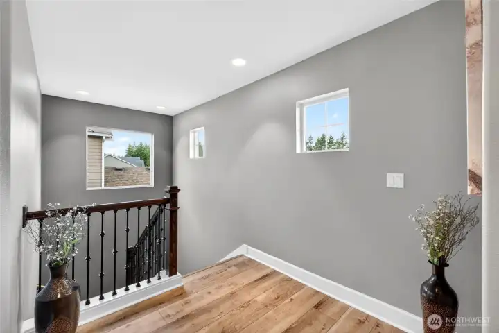 Feel the openness of the upstairs landing with extra natural light.