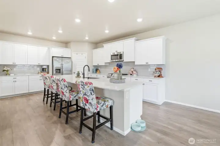 Tons of cabinet space in this large kitchen