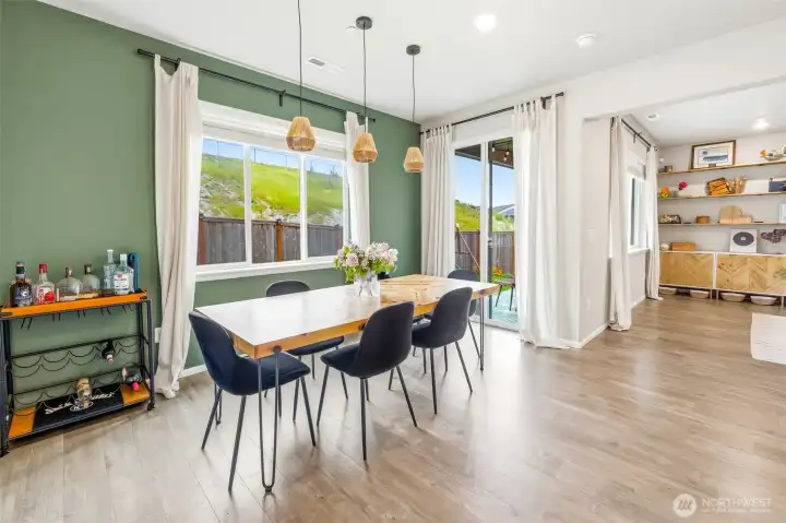 Roomy dining area leads to your covered outdoor -- perfect for entertaining friends and family