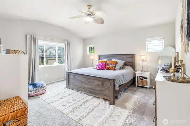Primary suite is set off by an entry way, large closet and 5-piece bath.  Extra windows bring in light!