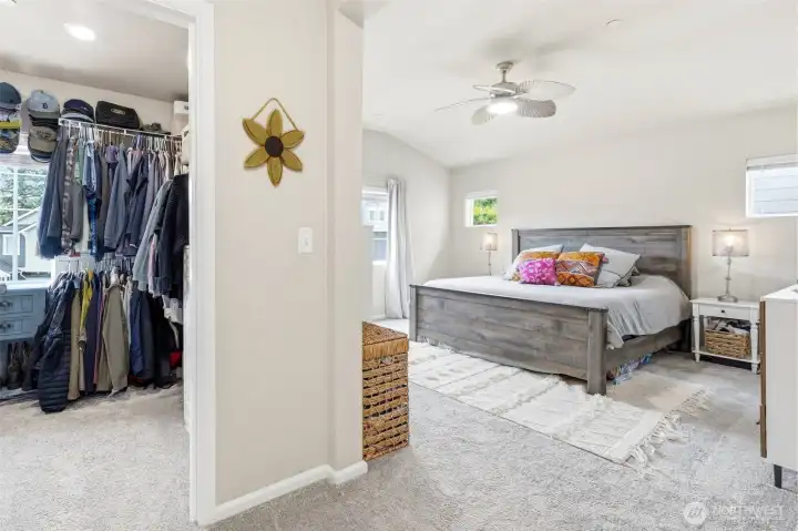 Primary features a sunlit walk-in closet and 5-piece bathroom en suite