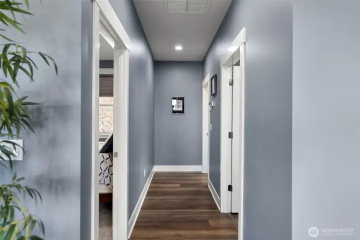 Hallway to spare bedroom, bath and laundry