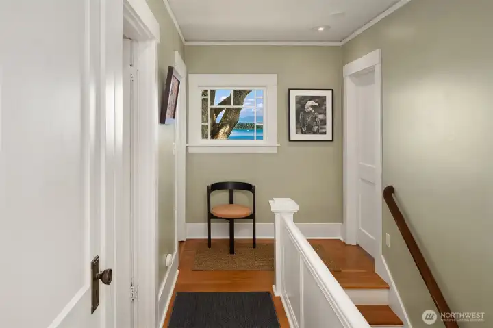 An airy upstairs landing, with an old-growth maple standing watch. An airy upstairs landing, with an old-growth maple standing watch.