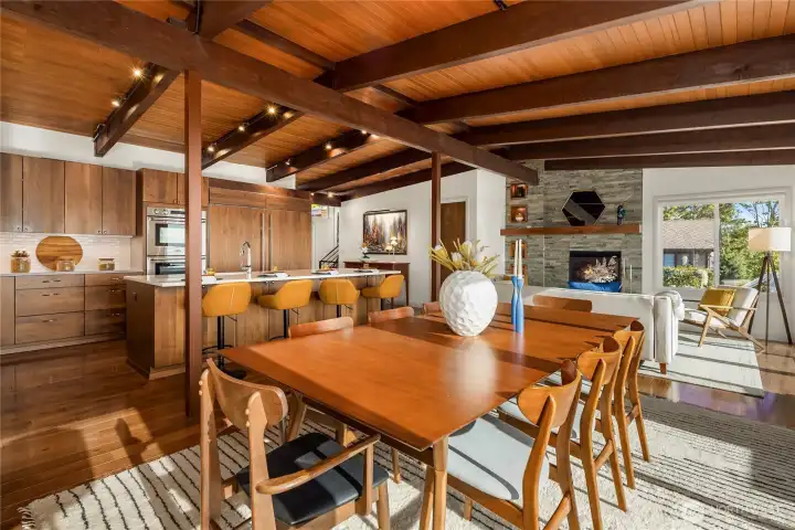 Interior of main living space from dining area. Dining room comfortably fits seating for eight people.