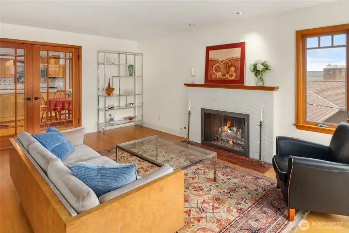 French doors open to large kitchen with eating area. French doors open to large kitchen with eating area.