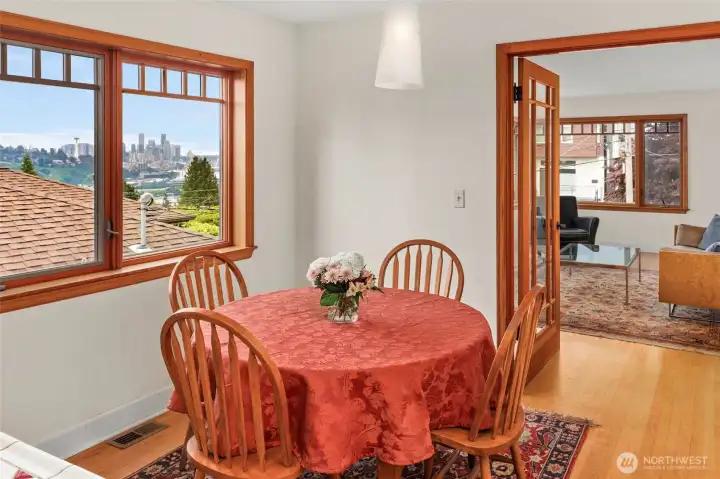 Eating area in the kitchen with city views. Eating area in the kitchen with city views.