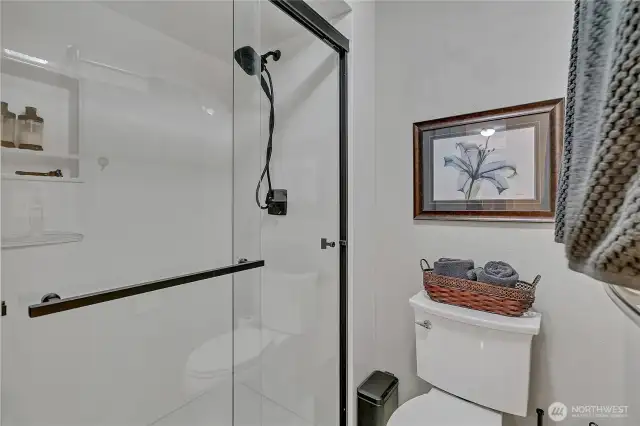 2025 new:  "Silverado" shower, non-porous, solid surface ONYX Collection material.  No grout!  SilveradoShowers.com.  Heated towel rack. Elegant & Easy!