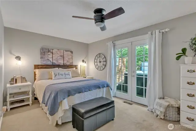 Lovely side bedroom with French Doors to deck & hot tub. Colors selected for serenity.
