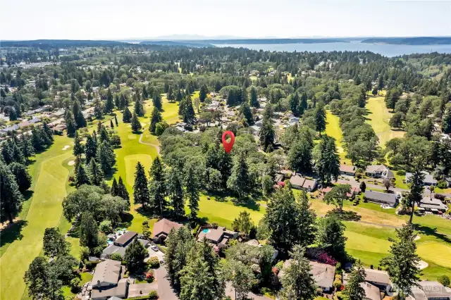 Distinctive property with direct golf course access. Nestled in the Evergreens.  YES, it is truly in there! Updated! Pre-Inspected!