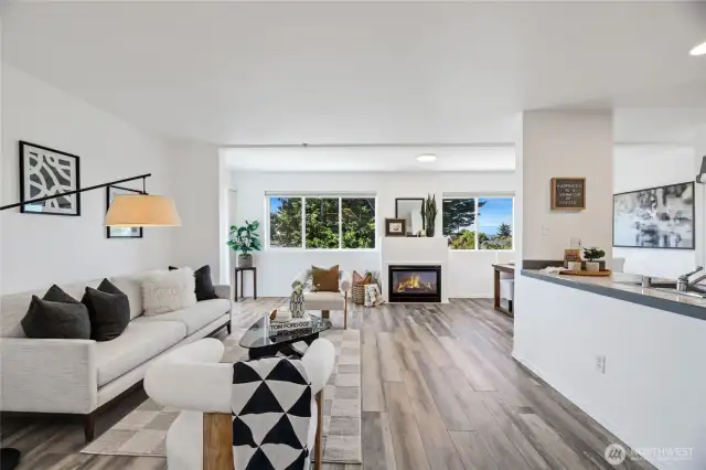 Bright Living Room with gas fireplace.