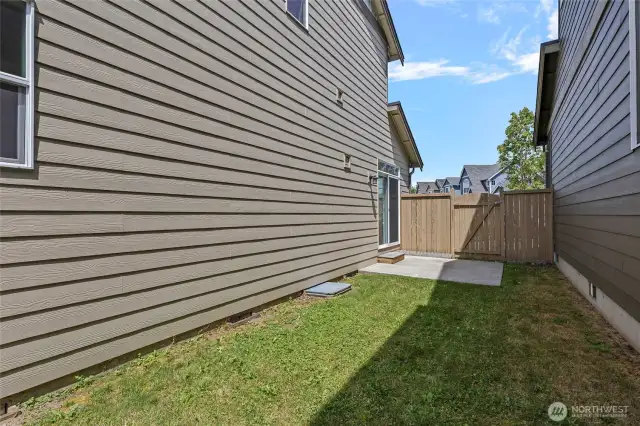 On the far side is a private patio off the dining area to enjoy.