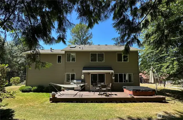 View of entertainment-sized sundeck. Large deck allows separate BBQ/Outdoor dining, lounging and hot-tub areas.