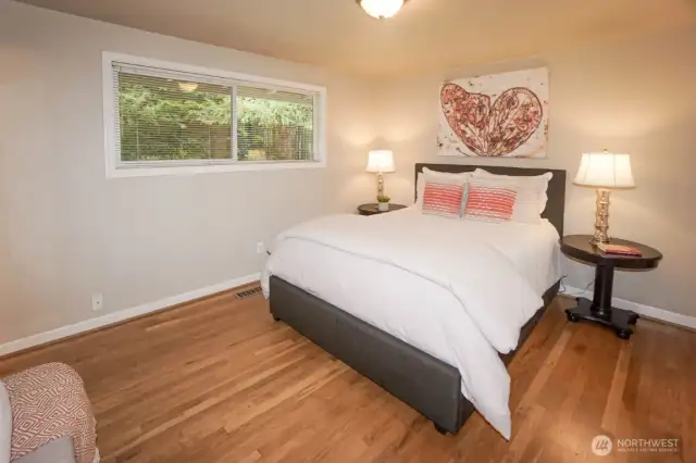 Primary Bedroom with Window to Backyard