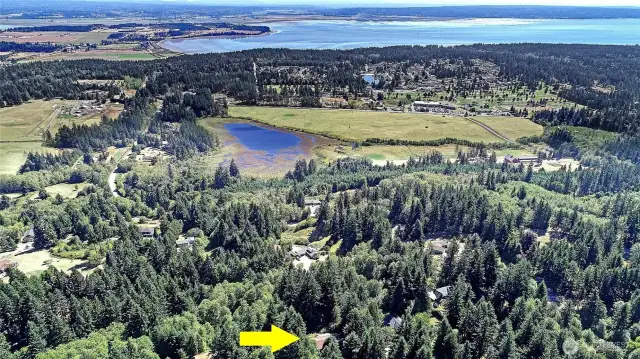 Looking East toward Kristoferson Lake and Farm with Port Susan and the North Cascade Mountain Range.