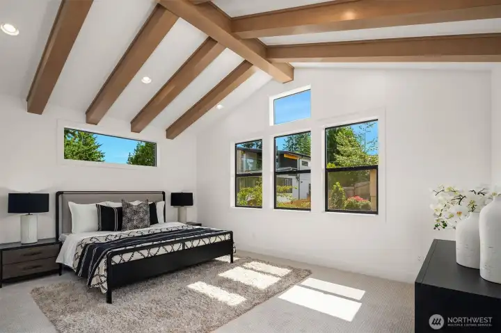 Designer primary suite with five-piece bath with heated floors