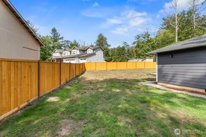 Yard on the left side of the home