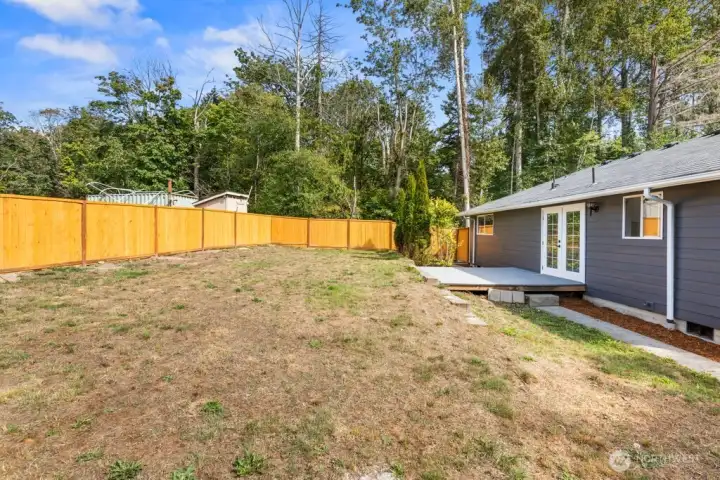 French doors (2nd entryway) lead out to backyard and deck