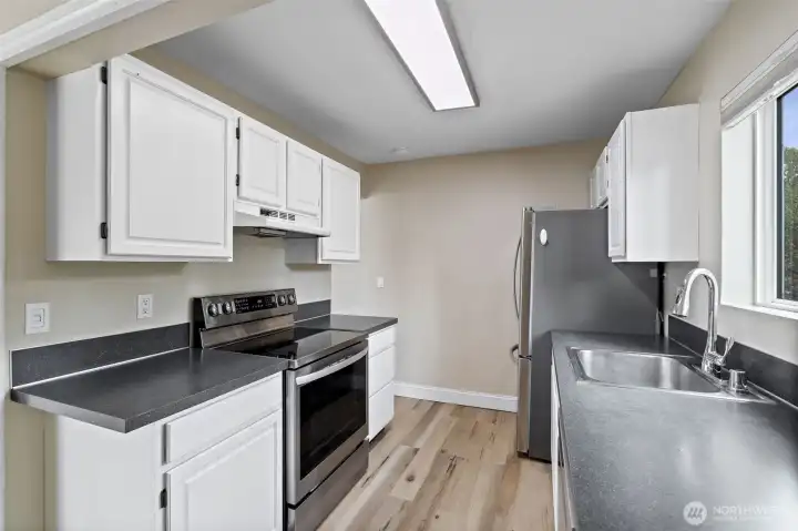 Kitchen with new SS appliances