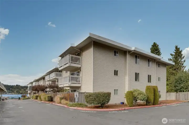 End unit second floor, this unit is stepped out from the main building for a great lake view.