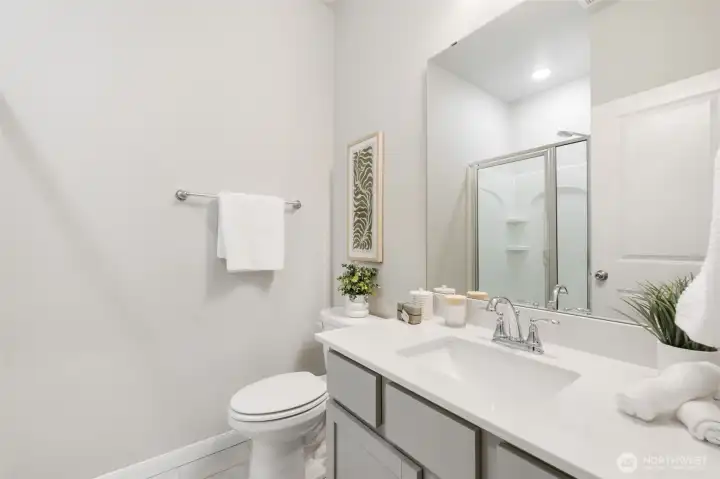 Main floor ¾ bath conveniently located across from the fourth bedroom.