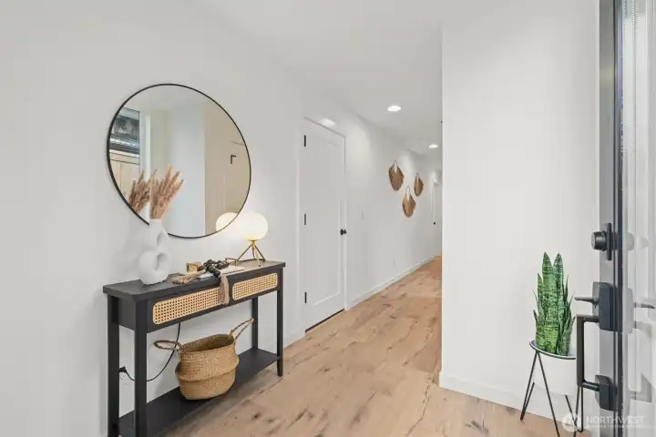Foyer and hallway to bedroom and full bathroom