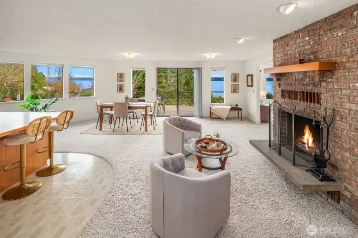 The main level is open concept with the kitchen, dining area, sitting area and generous living room naturally flowing together to create a fabulous vibe.