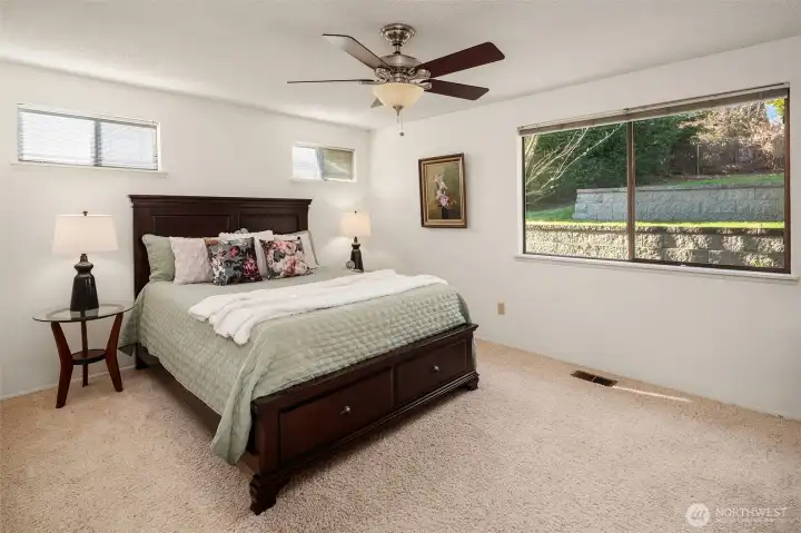 Primary suite on the main level with walk-in closet and private 3/4 bath.